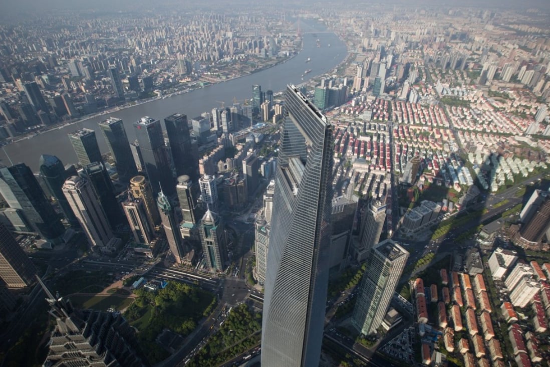 A general view from Shanghai Tower Observation Deck showing Shanghai World Financial Center. Photo: EPA