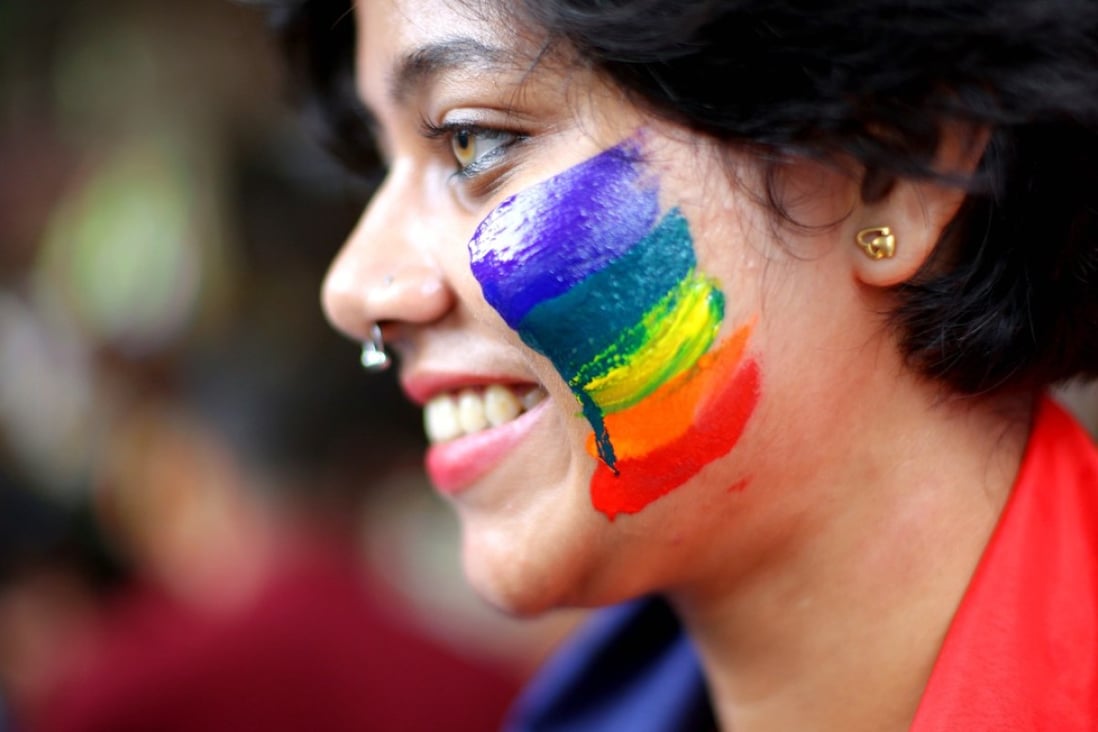 An LGBTI activist celebrates India’s overturning of a law criminalising gay sex. The Indian court’s verdict has inspired campaigners seeking a similar move in Singapore. Photo: EPA