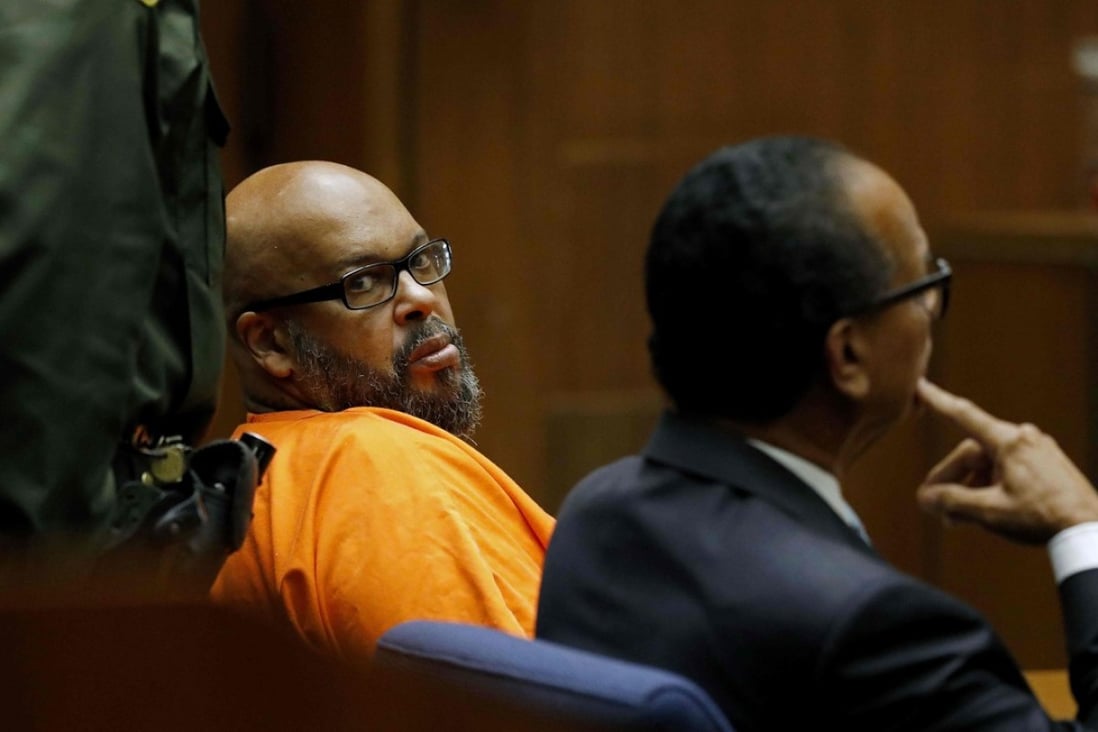Marion “Suge” Knight, with his lawyer Albert DeBlanc, pleads no contest to voluntary manslaughter in Los Angeles Superior Court. He was sentenced to 28 years in prison. Photo: Gary Coronado/Pool/AFP
