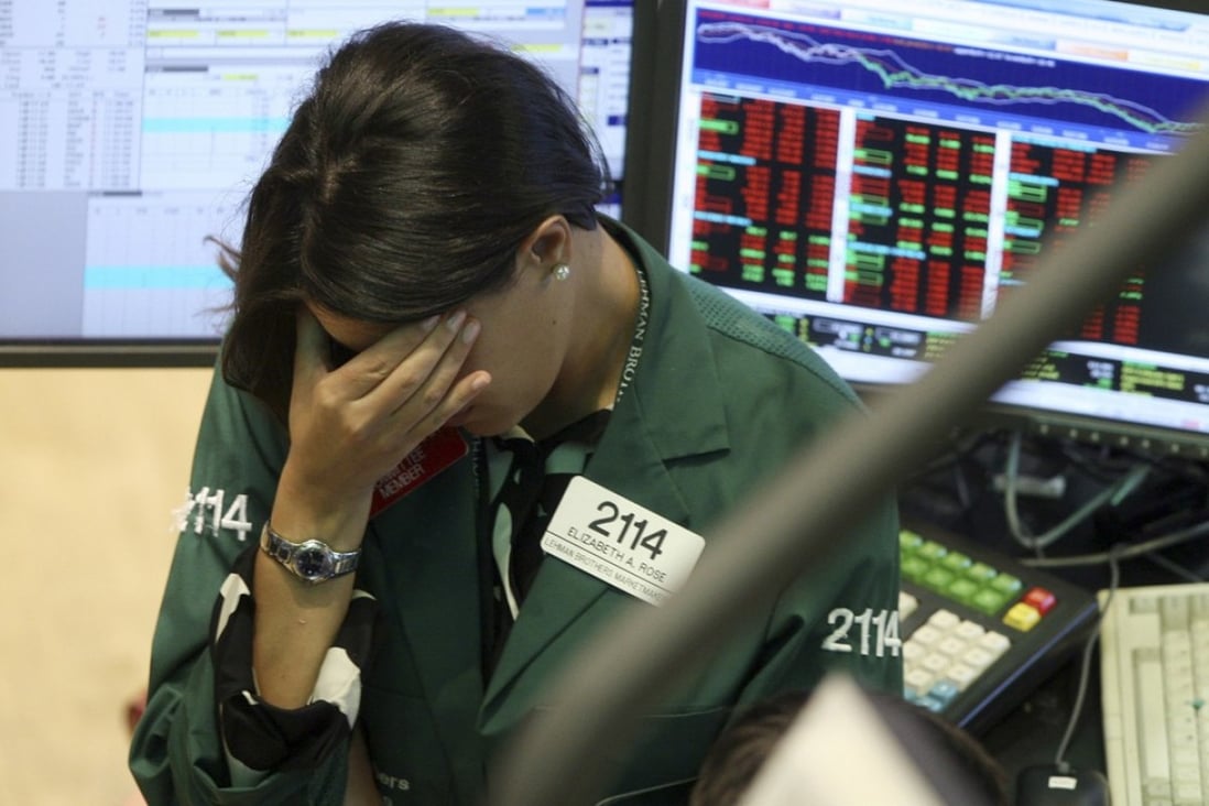 A specialist with Lehman Brothers MarketMakers reacts to the fallout from Lehman Brothers declaring bankruptcy on September 15, 2008, as panic began to spread through the financial system, leading to the Great Recession. Photo: AP