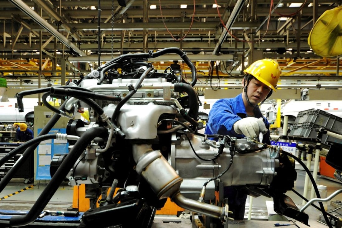 An assembly line producing automobiles in Qingdao, Shandong Province on March 1, 2016. Photo REUTERS