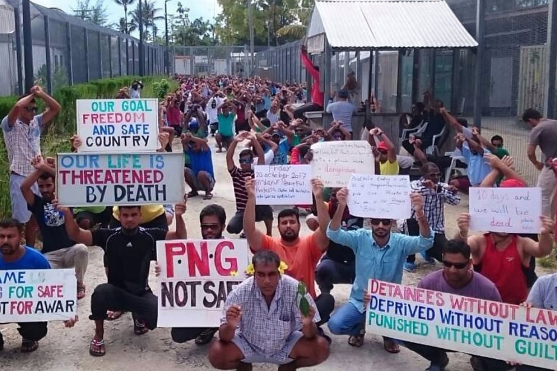 Refugees and asylum seekers protest at Australia’s now-closed Manus Island immigration detention centre in Papua New Guinea. Photo: AP