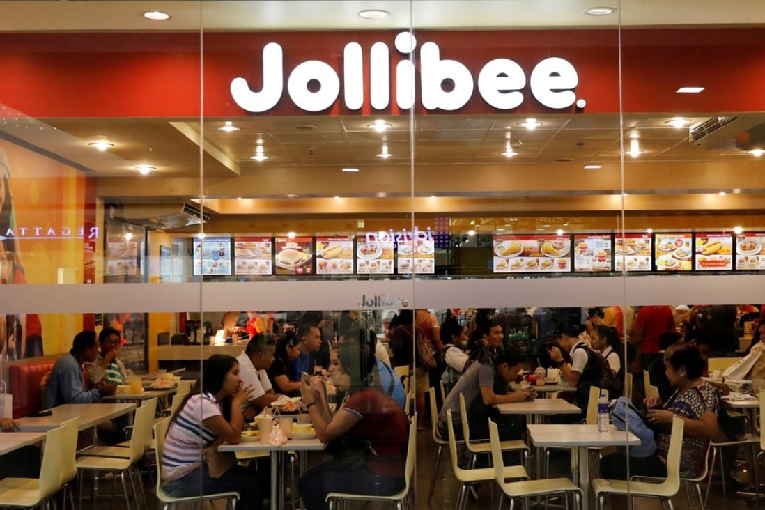 Customers eat at a Jollibee outlet in Quezon City. Photo: Reuters