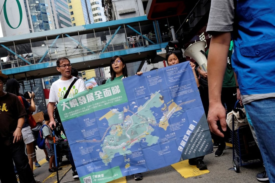 Protesters march in opposition to Chief Executive Carrie Lam’s plan to reclaim 1,700 hectares of land east of Lantau Island. Photo: Reuters