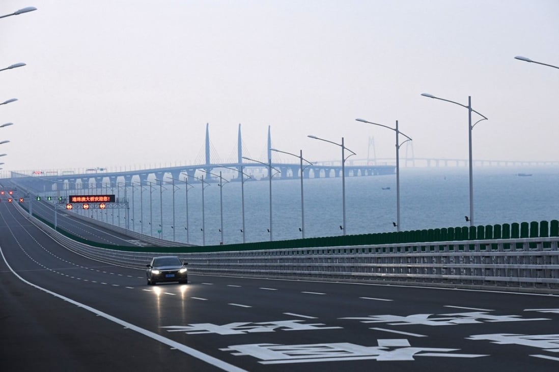 A car drives on the Hong Kong-Zhuhai-Macau Bridge. Photo: Xinhua