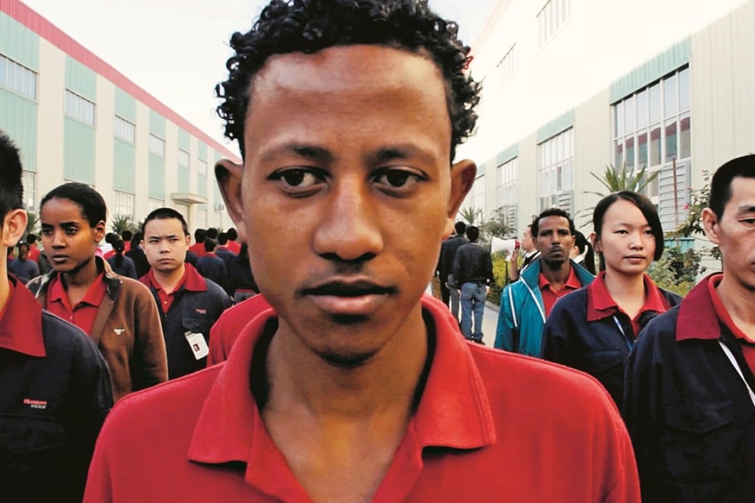 A still from documentary Better Angels shows Ethiopian and Chinese workers about to start a shift at a factory in Ethiopia. Photo: Better Angels