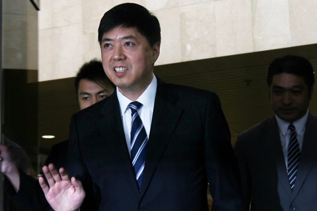 Hong Kong businessman Stephen Lau Hei-wing shown in June 2009, leaving the High Court after testifying. A Chinese court has jailed nine former prosecutors over his death in custody last year. Photo: KY Cheng