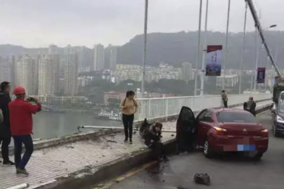 The bus appeared to have crashed through the barriers after the collision with the car and plunged 65 metres to the bottom of the river. Photo: Sina.com.cn