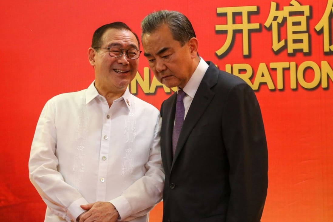 Philippine foreign minister Teodoro Locsin with his Chinese counterpart Wang Yi at the new Chinese consulate in Davao. Photo: AFP