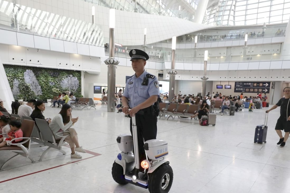 A mainland police officer at the express rail link’s West Kowloon station. Photo: Felix Wong