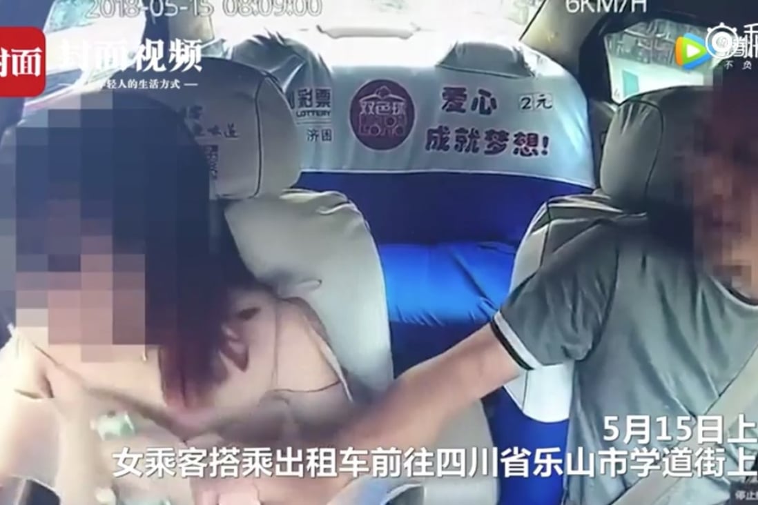 In May, a taxi driver in China’s Sichuan province was sacked having been caught on his dashboard video camera pulling at the top and leering at a female passenger. Picture: Miaopai
