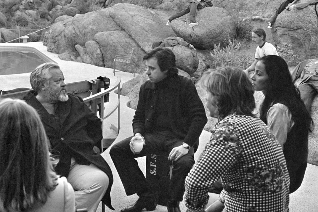 Orson Welles (second from left) on the set of The Other Side of the Wind. Photo: José María Castellví/Netflix