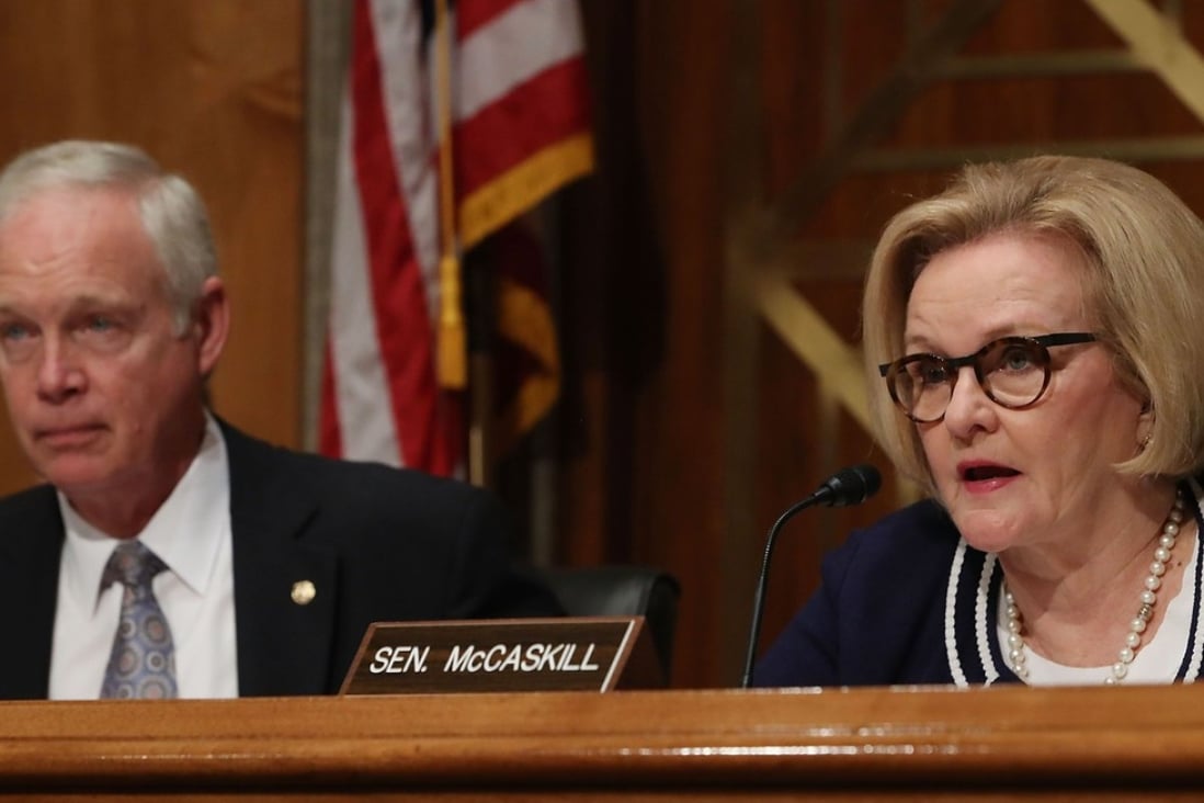 Senator Claire McCaskill, a Missouri Democrat, speaks while flanked by Republican Chairman Ron Johnson of Wisconsin during a Senate Homeland Security and Governmental Affairs Committee hearing in Washington on October 10. Both senators have demanded an investigation into claims that Chinese spies potentially compromised Apple and Amazon by infiltrating a motherboard factory. Photo: Getty Images via AFP