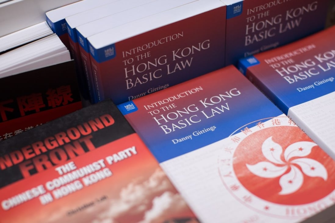 A book published by Hong Kong University Press introducing the Hong Kong Basic Law, the city's mini-constitution, during the Hong Kong Book Fair in July. Photo: EPA-EFE