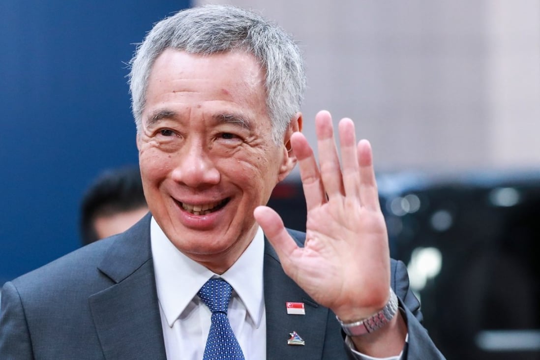Prime Minister Lee Hsien Loong has said he wants to hand over the reins by 2022. Photo: EPA