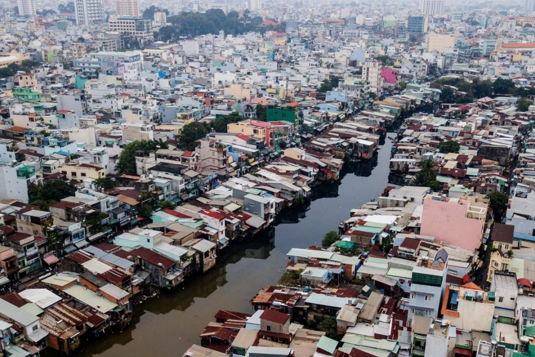An aerial view of the slums along the Xuyen Tam canal in Ho Chi Minh City. Photo: AFP