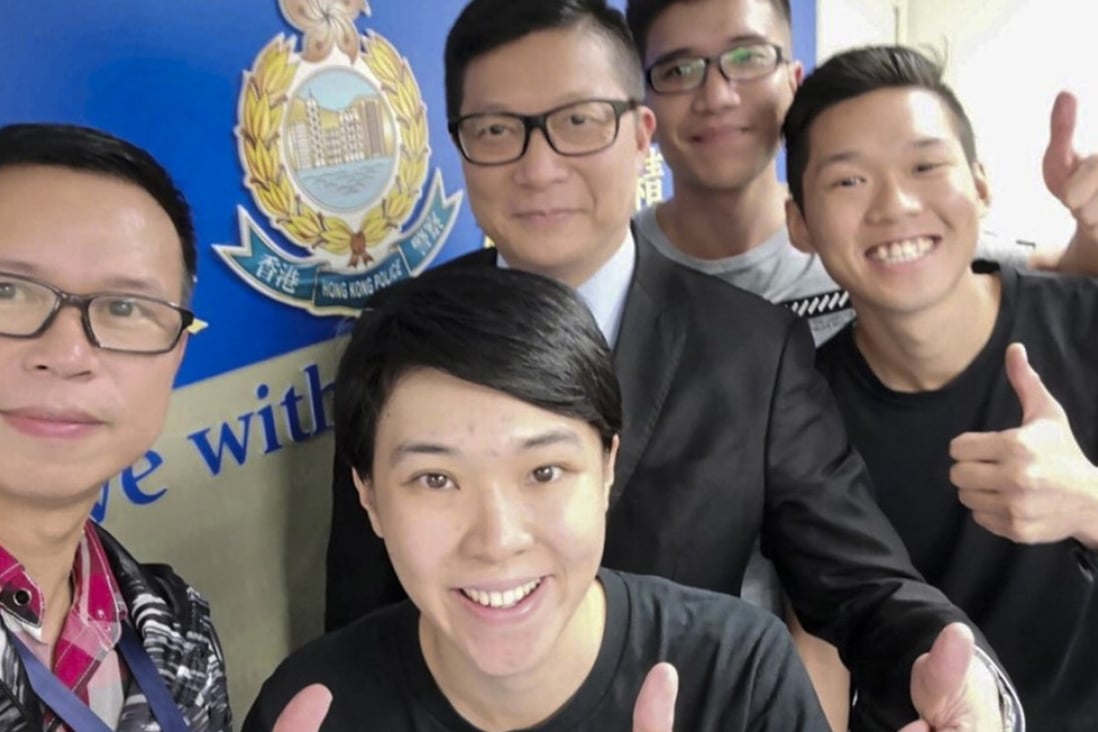 Chris Tang (third left) with the officers, including Yuen (second left), on Thursday. Photo: Handout