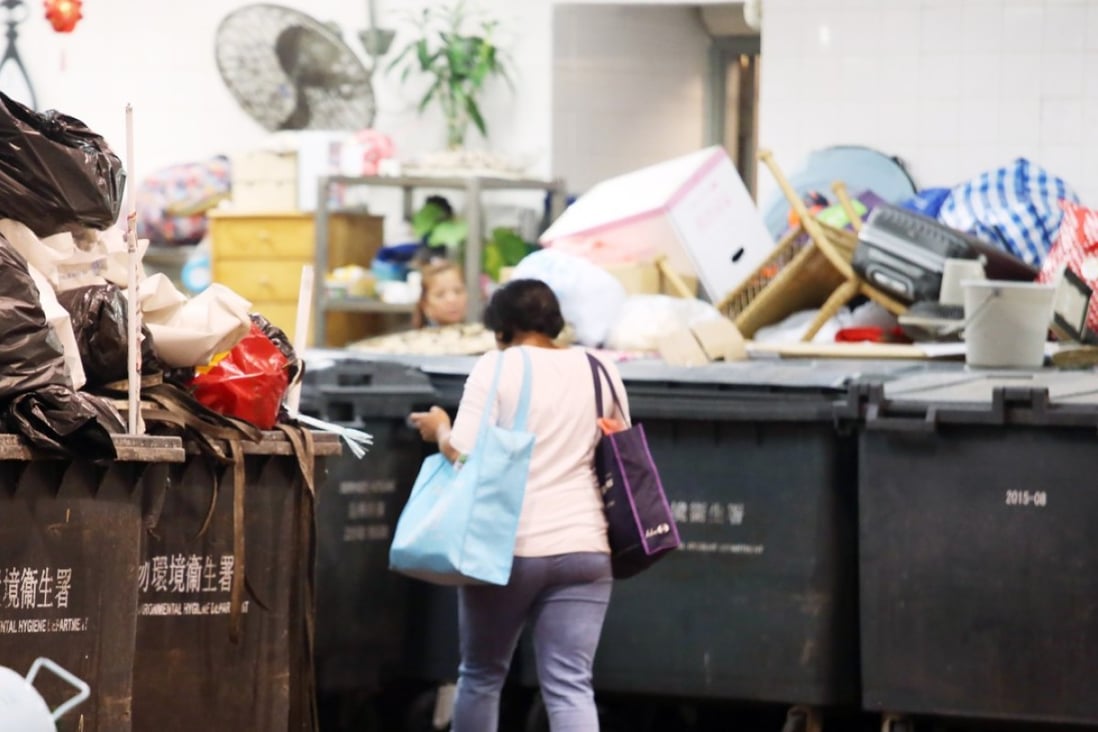 Waste is piled up at a refuse collection point in March 2017. The Hong Kong government has proposed that housing estates, residential buildings and shops using government refuse collection services pay for each bag of waste disposed. Photo: David Wong