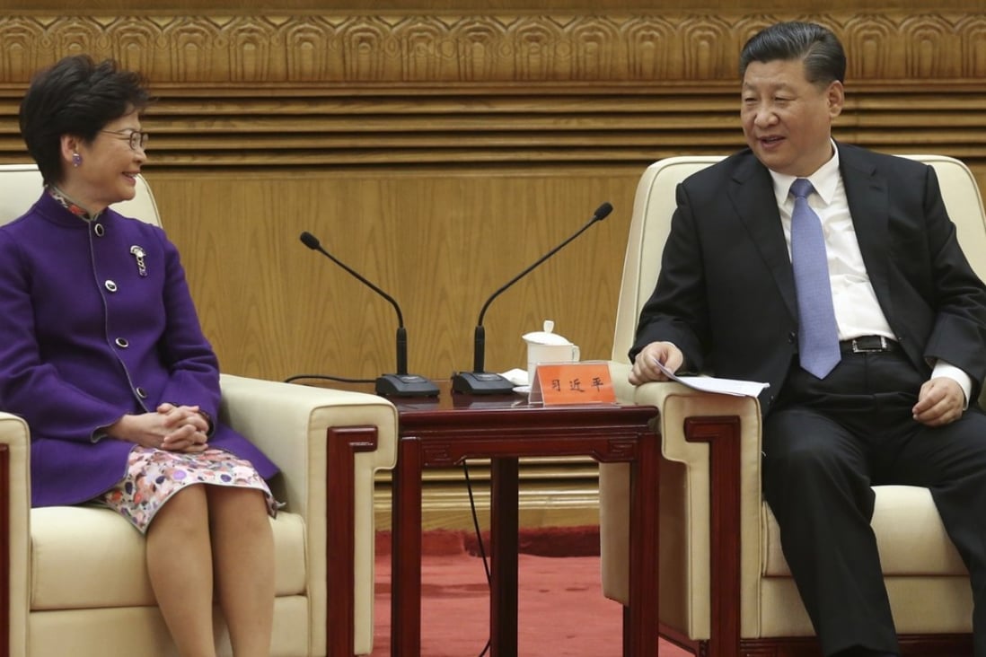Carrie Lam (left) on Monday with Xi Jinping. The Hong Kong leader said her government would study how the president’s hopes could be integrated into policies. Photo: Handout