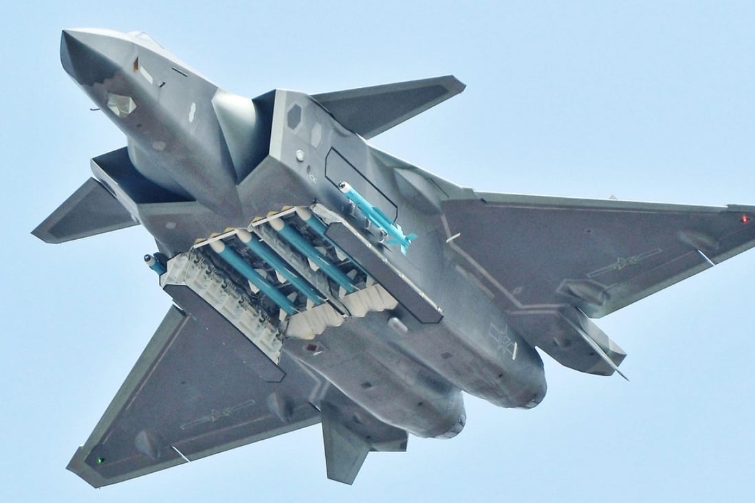 A Chinese J-20 flies with its weapon bays open during the Zhuhai air show. Photo: Weibo
