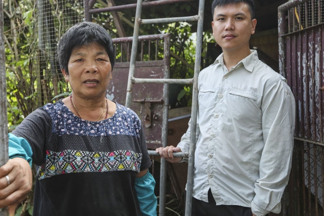 Peng Lanxiang (left) at her village home with Frank Yau. Photo: Xiaomei Chen