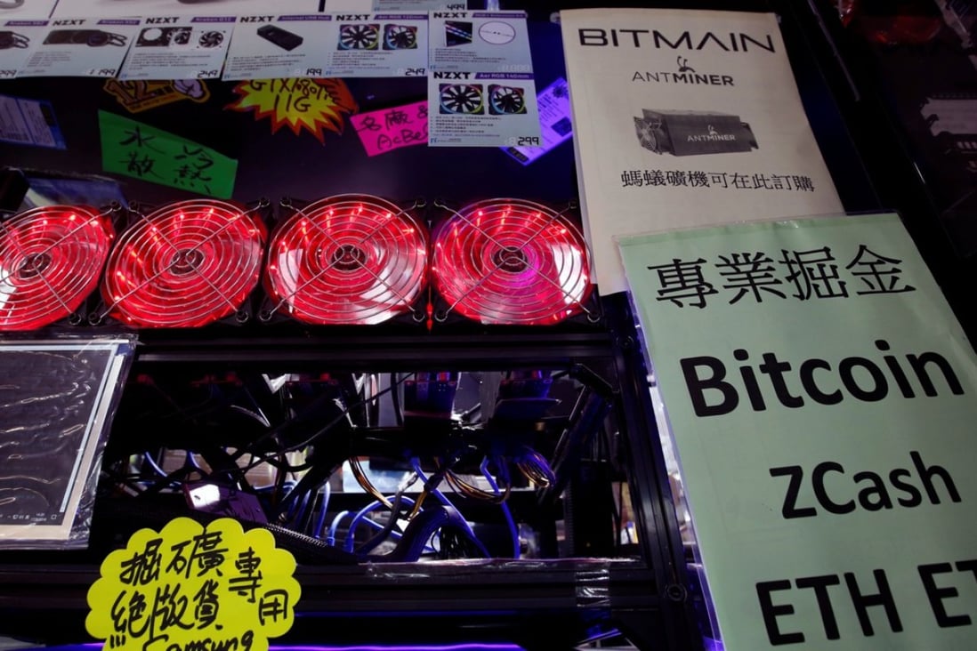 A cryptocurrency mining computer equipped with cooling fans displayed at a computer mall in Hong Kong, May 17, 2018. Photo: Reuters