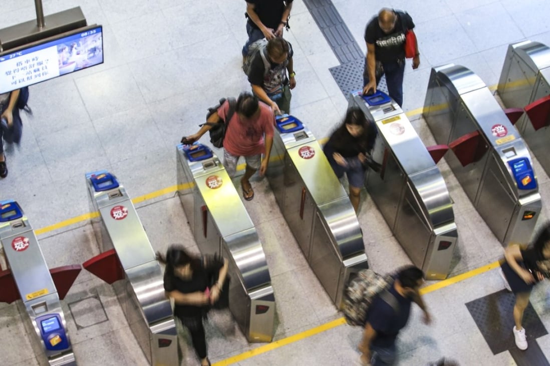 By the middle of 2020, commuters will have the option of entering MTR stations by linking their AlipayHK account to a separate MTR app, and scanning a QR code on their smartphones on the readers installed at the entry gates. Photo: Felix Wong