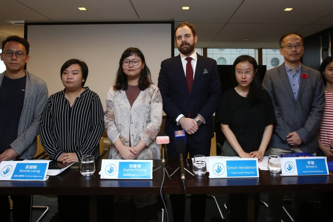 Meeting the press on November 7 are members of the Hong Kong UPR Coalition, including (from left): Lam Yin-pong from the Hong Kong Journalists’ Association, Bonnie Leung from the Civil Human Rights Front, Sophie Cheung from Disabilities CV, Simon Henderson and Annie Li from Justice Centre Hong Kong, Jerome Yau from Pink Alliance, and Isabella Ng from the Hong Kong Society for Asylum-Seekers and Refugees. Photo: Jonathan Wong