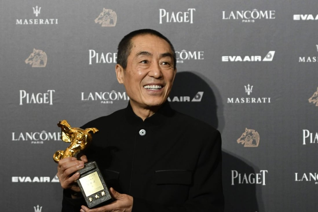 Chinese director Zhang Yimou with his trophy after winning the best director award for his film “Shadow” at Taiwan’s 55th Golden Horse film awards in Taipei on Saturday. Photo: AFP