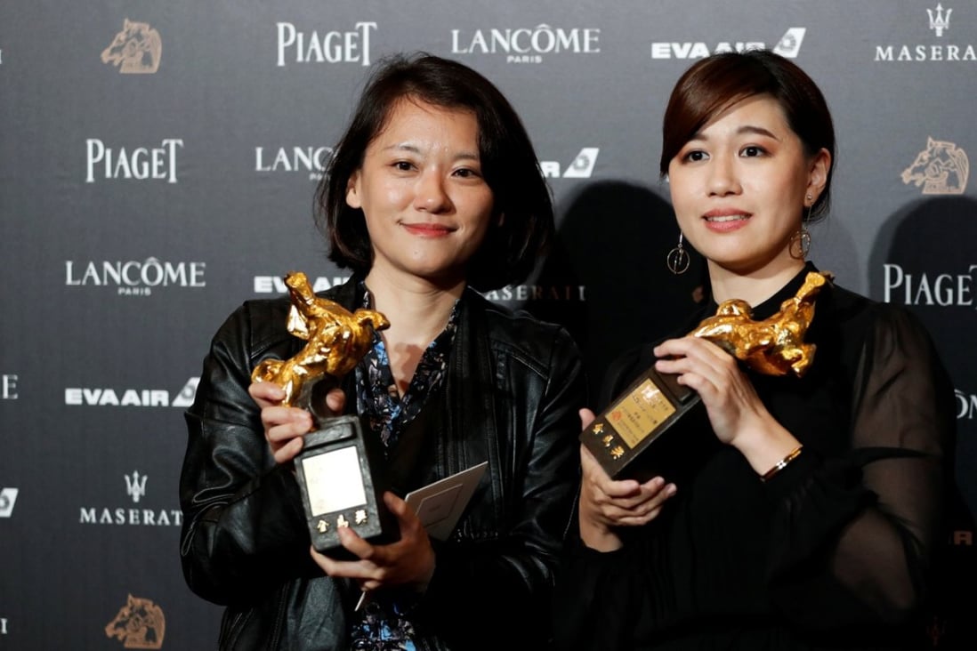 Taiwanese director Fu Yue (right), who made the controversial speech, poses backstage after winning best documentary for her film “Our Youth in Taiwan” at the 55th Golden Horse Awards on November 17. Photo: Tyrone Siu