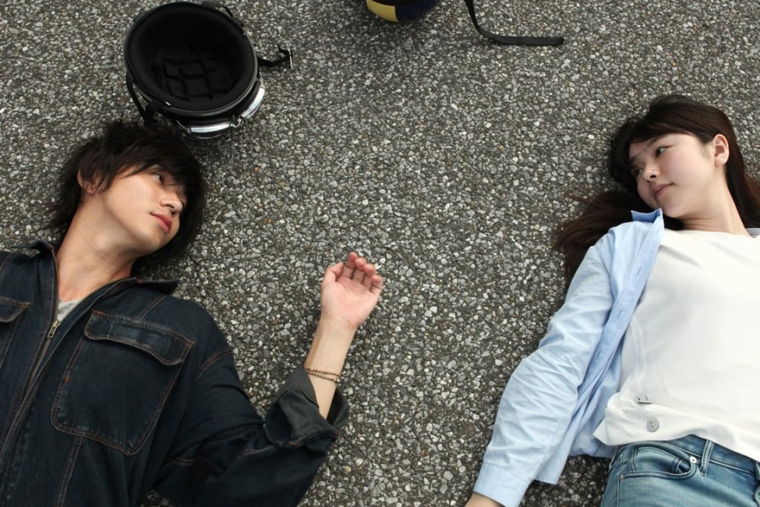 Masahiro Higashide and Erika Karata in a still from Asako I & II (category IIA, Japanese), directed by Ryusuke Hamaguchi.