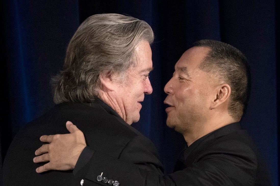 Former White House strategist Steve Bannon (left) greets fugitive Chinese billionaire Guo Wengui before introducing him at a news conference on Tuesday in New York. Photo: AFP
