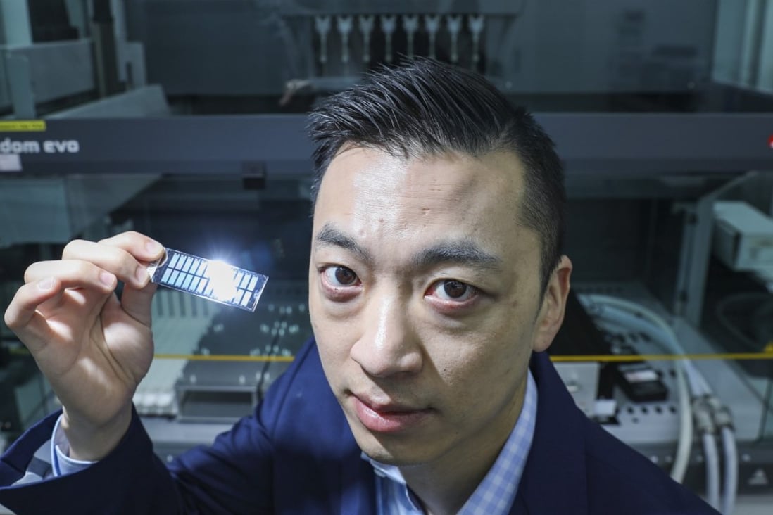 Danny Yeung Sheng-wu, CEO and co-founder of Prenetics, displays a biochip in the company’s laboratory for genetic testing in Quarry Bay, Hong Kong. Photo: Nora Tam