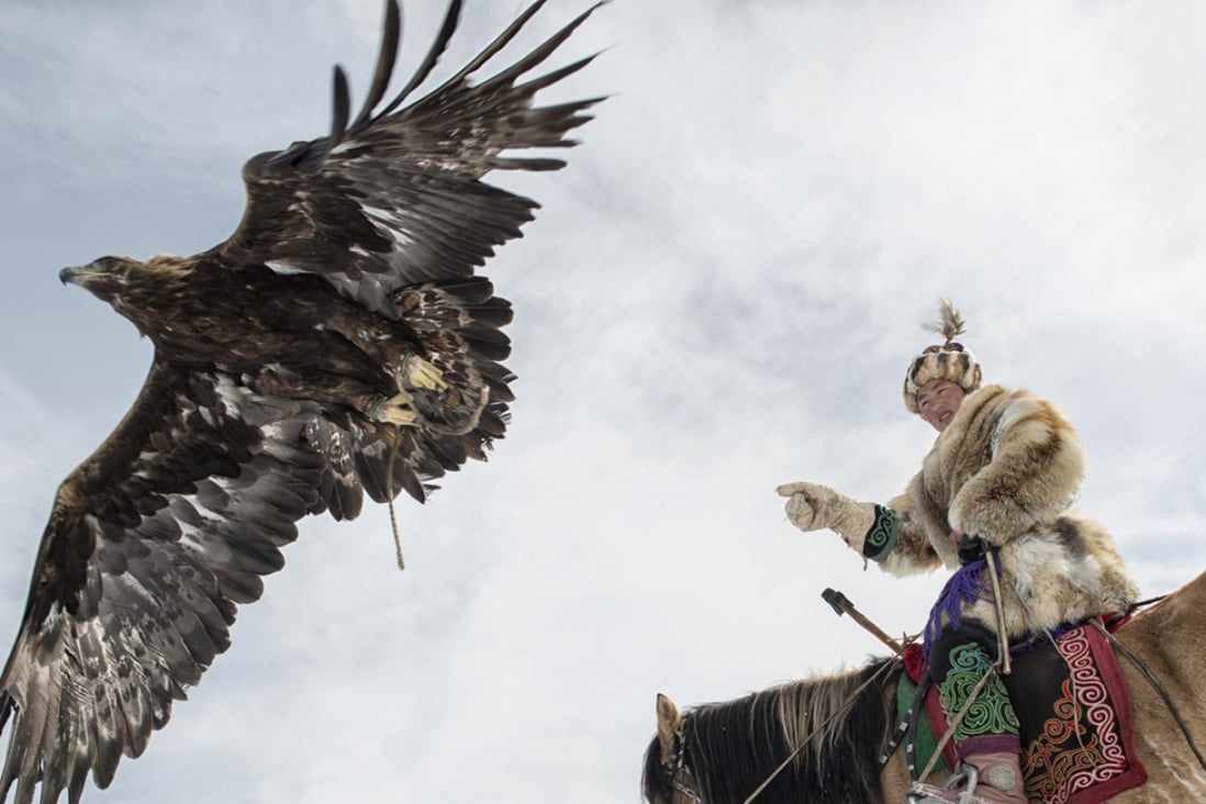 Huntress Aigerim Asker trains ahead of the Golden Eagle Festival, in Ölgii, Mongolia, in October. Picture: Zigor Aldama