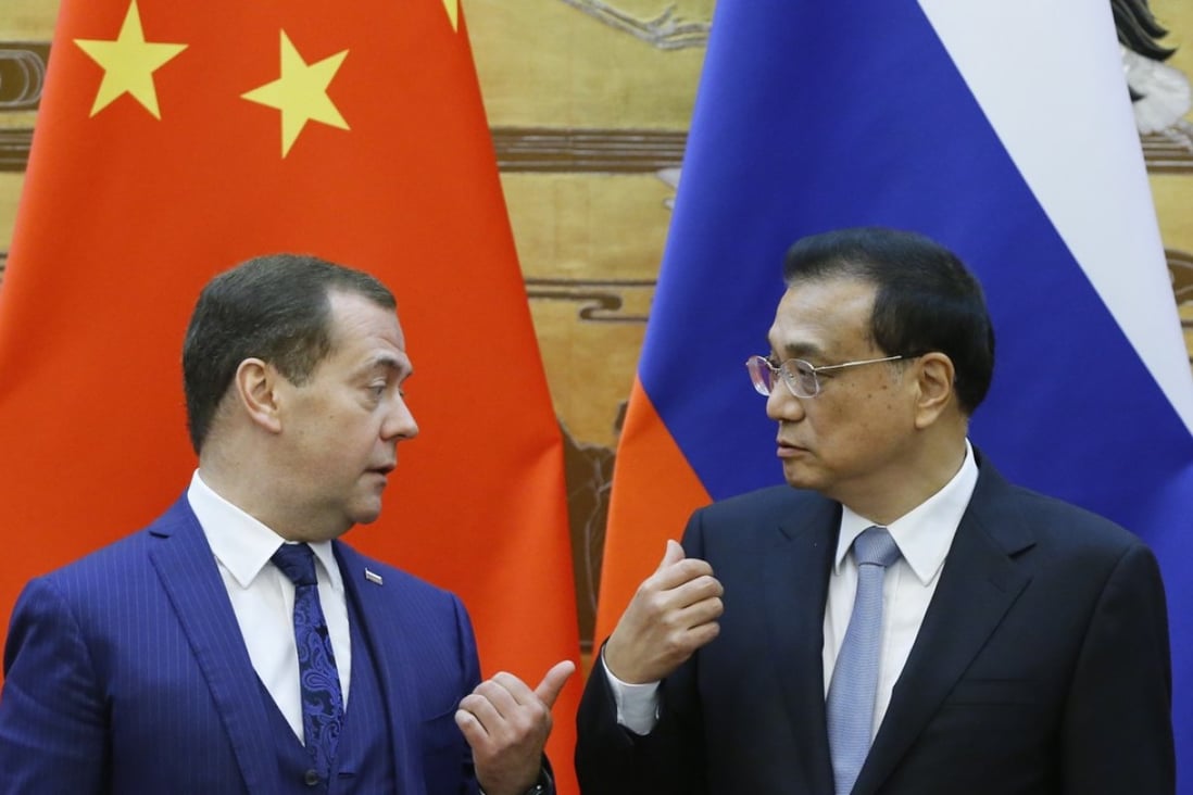 Russian Prime Minister Dmitry Medvedev (left) and Chinese Premier Li Keqiang in Beijing’s Great Hall of the People earlier this month. Photo: EPA