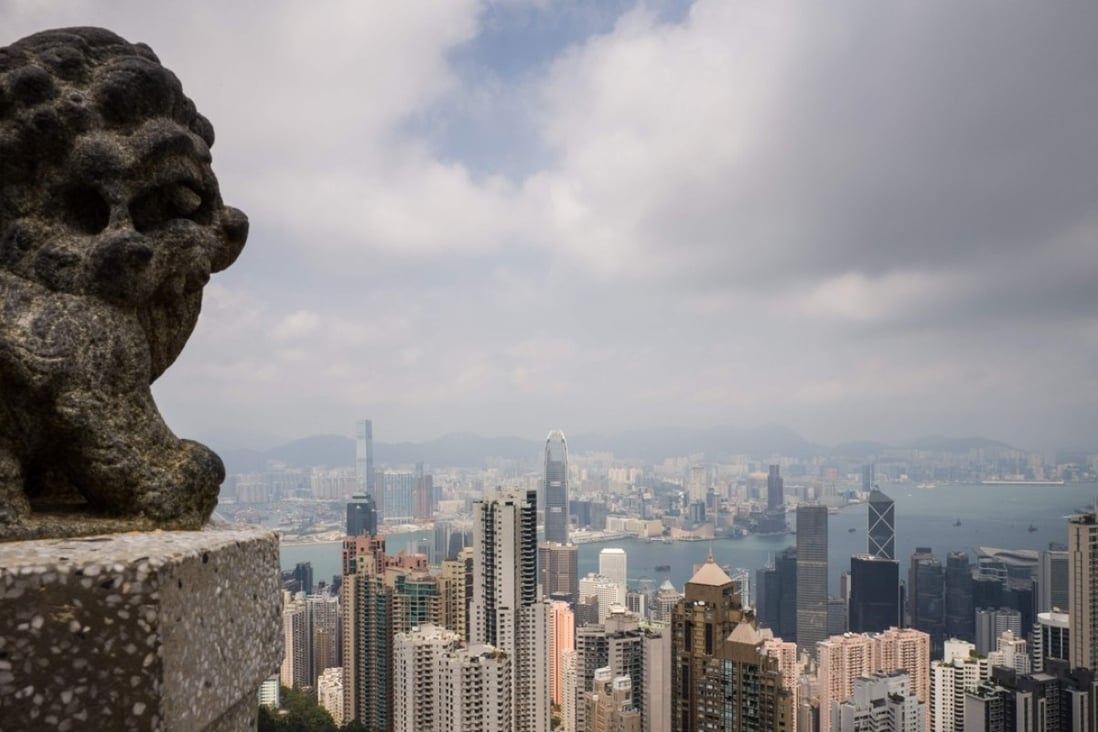 Hong Kong’s Securities and Futures Commission does not regulate platform operators trading virtual assets that are futures contracts or derivatives. Photo: AFP