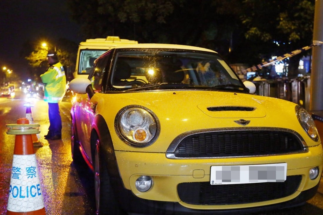 Wong Siew Fing, 47, and her daughter, Lily Khaw Li Ling, 17, were found dead in this yellow Mini Cooper. Photo: Edmond So.