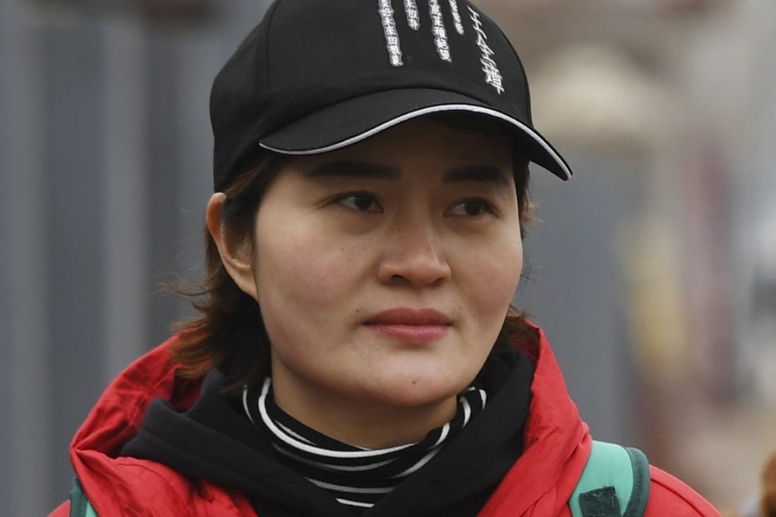 Li Wenzu, the wife of detained human rights lawyer Wang Quanzhang, was not permitted to leave China to receive an award for her human rights work. Photo: AFP