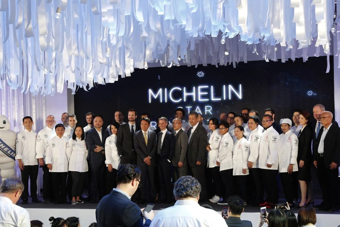 Khun Gee and Michelin star winners on stage at the Michelin Star Revelation 2019, in Bangkok, Thailand. Picture: EPA