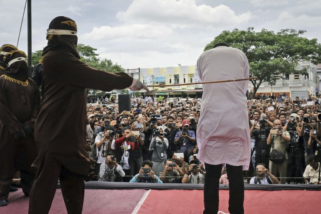 Homosexuality is regulated by law in the conservative province of Aceh, Indonesia, where a sharia law official whipped a man convicted of gay sex in 2017. Photo: AP