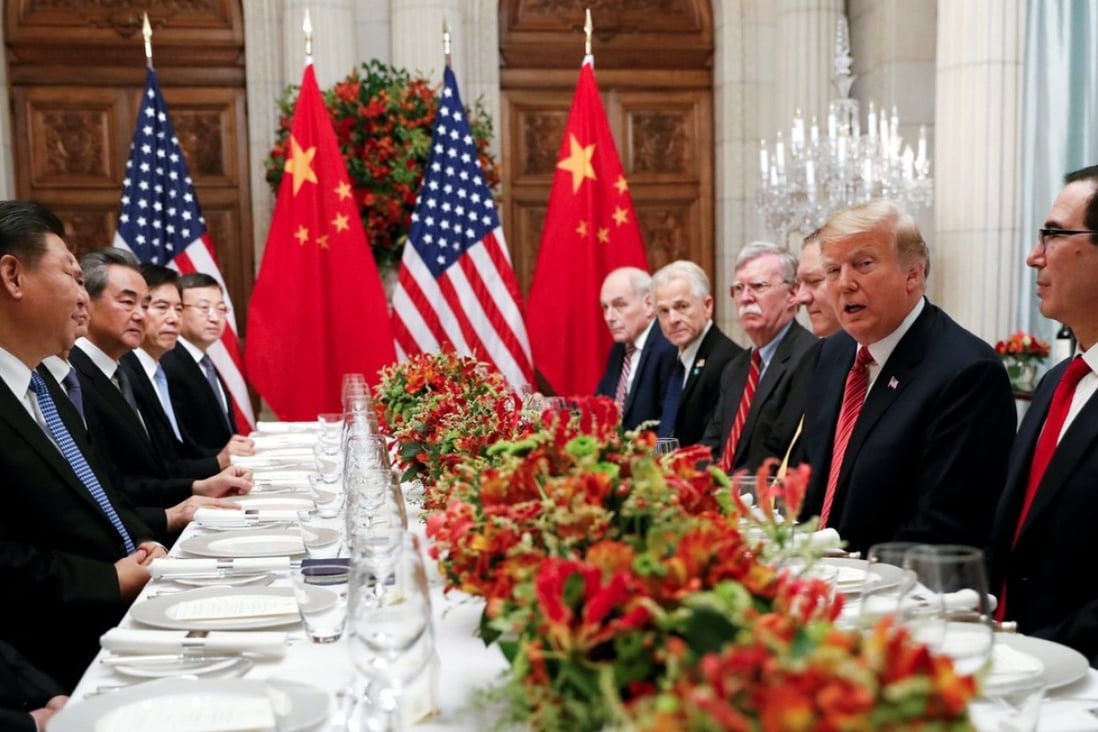 Chinese President Xi Jinping (left) and US President Donald Trump (second right) attend a working dinner after the G20 leaders summit in Buenos Aires on Saturday. Photo: Reuters