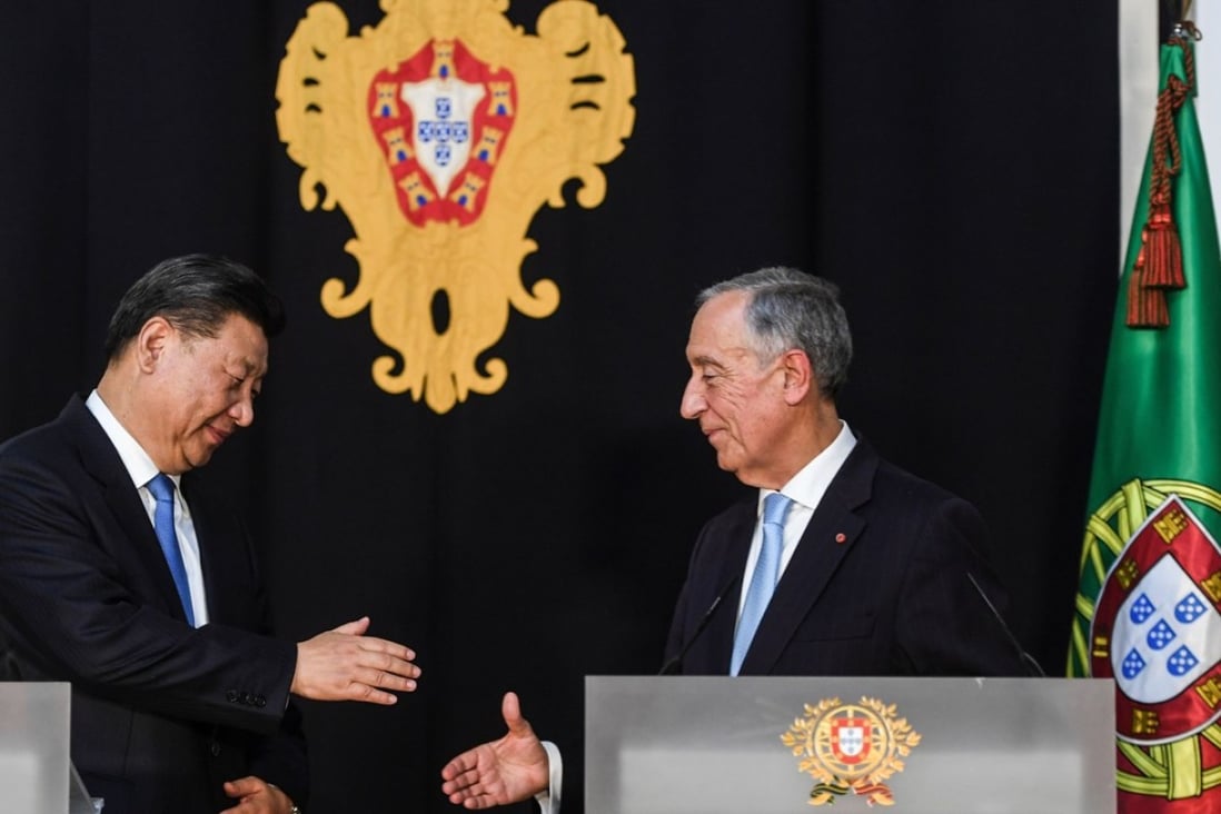 Presidents Xi Jinping and Marcelo Rebelo de Sousa shake hands after their meeting in Lisbon on Tuesday. Photo: AFP