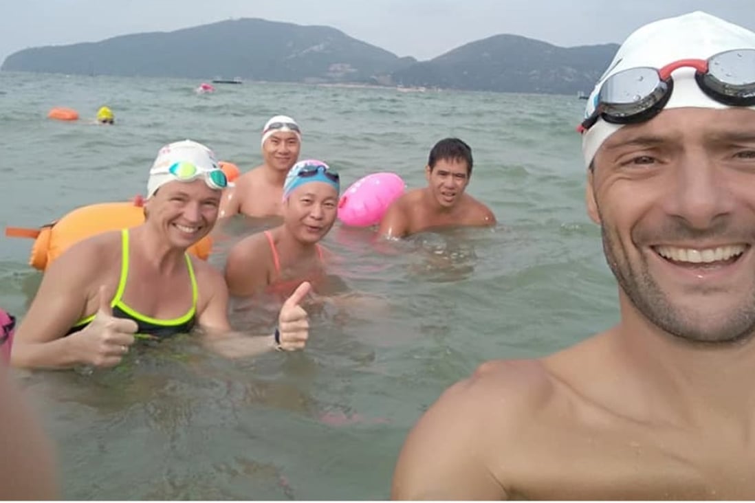 Olivier Courret with members of Hong Kong Open Water Swimmers. Photo: Handout