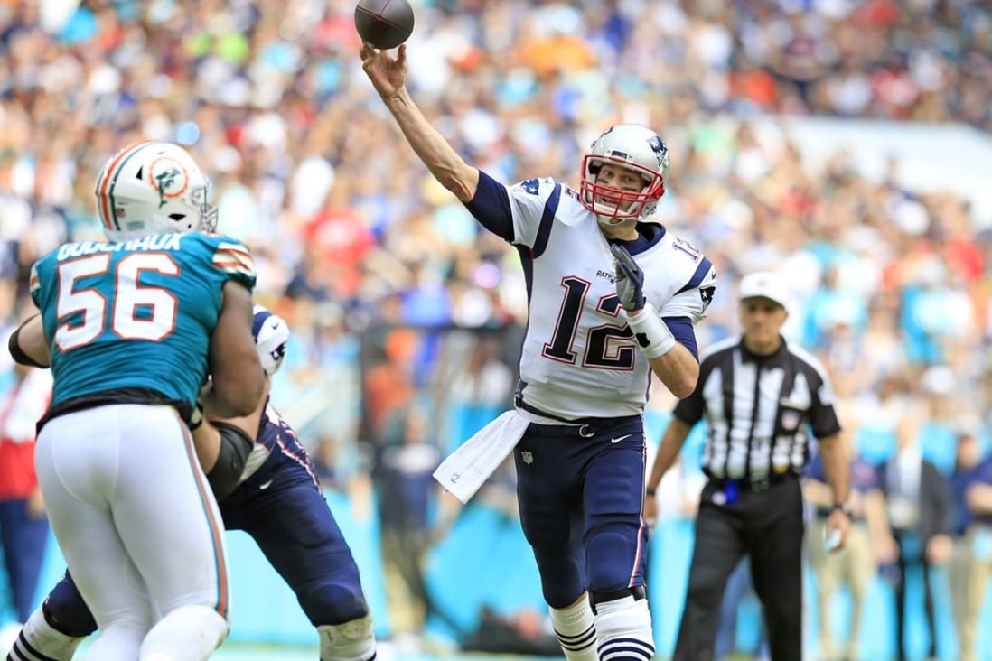 Patriot’s Tom Brady sets NFL passing touchdown mark in loss to Dolphins