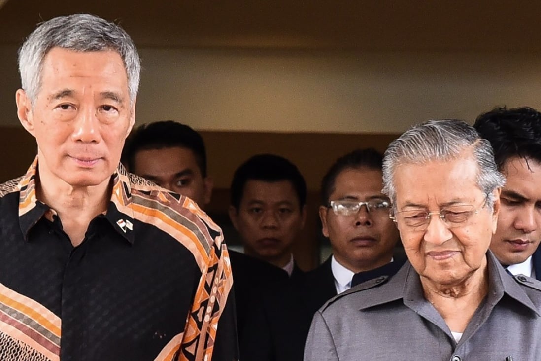 Malaysia’s Prime Minister Mahathir Mohamad and his Singaporean counterpart Lee Hsien Loong. Photo: AFP