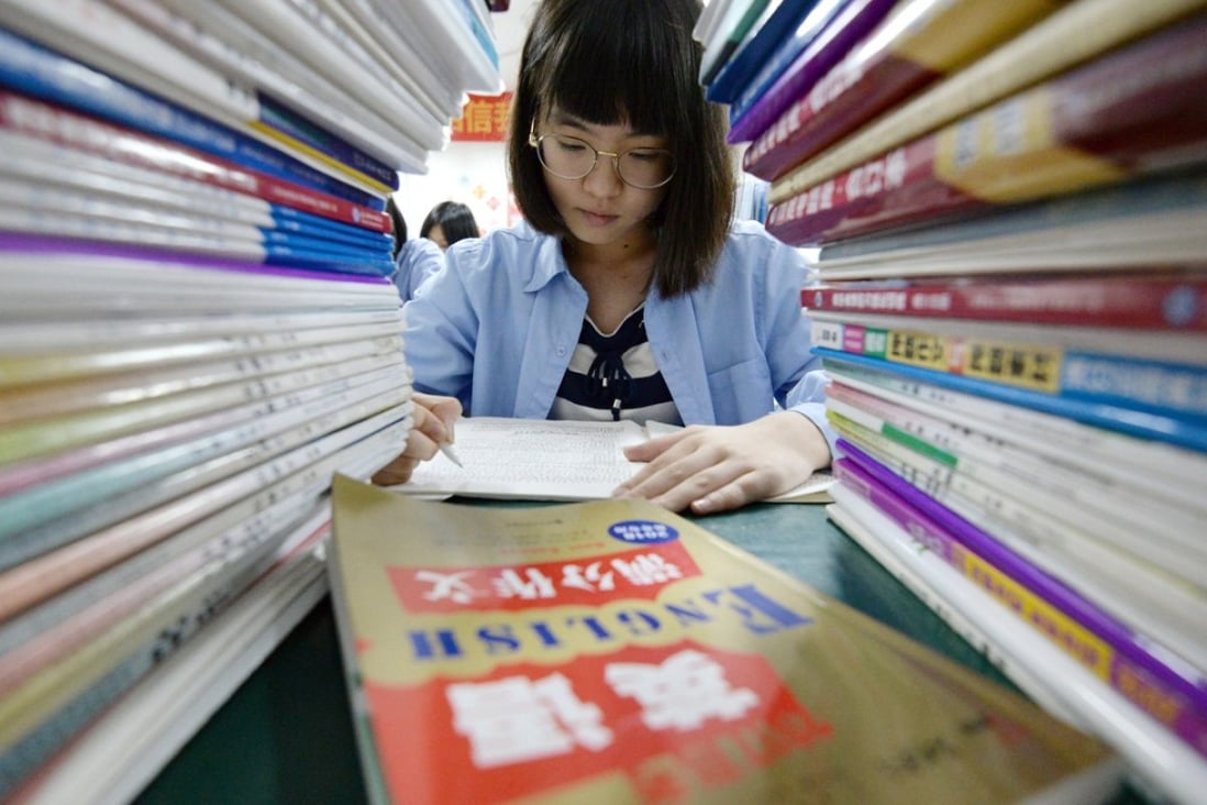 A Chinese student revises for the annual gaokao or college entrance exams in Handan, Hebei province, in May 2018. With an increasing number of Chinese students aiming to go to university abroad, English-proficiency testing has become the focus of attention. Photo: EPA-EFE