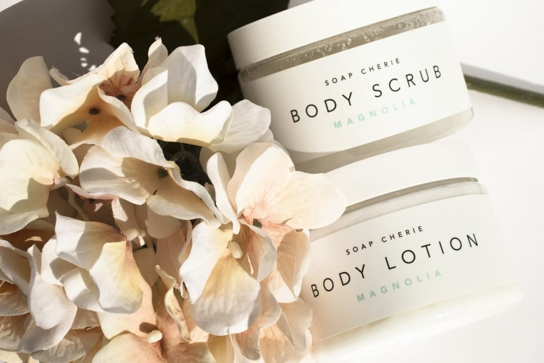 Soap Chérie magnolia body scrub and body lotion.