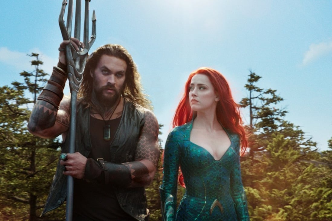 Jason Momoa and Amber Heard in a still from Aquaman (category IIA), directed by James Wan.