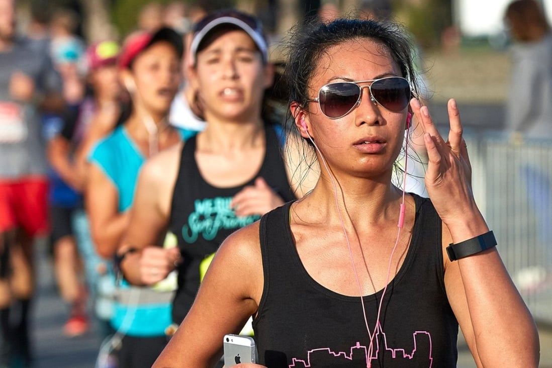 Running with headphones is not cheating. Get off your high horses South China Morning Post