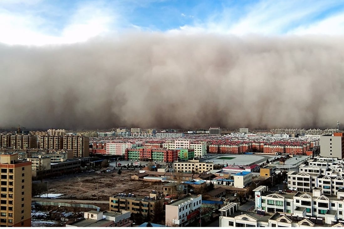 A town in northwest China’s Gansu province is engulfed by a sandstorm. Picture: Gansu province website